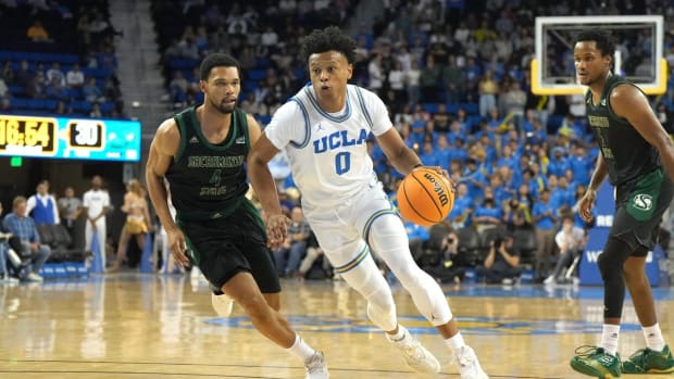 Nov 7, 2022; Los Angeles, California, USA; UCLA Bruins guard Jaylen Clark (0) dribble the ball against Sacramento State Hornets guard Zach Chappell (4) in the second half at Pauley Pavilion. Mandatory Credit: Kirby Lee-USA TODAY Sports